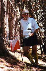 Joe Scarborough checks his escape route on the Green course at Mt. Pinos, June 2001 (Photo: Joel Thompson, LAOC)