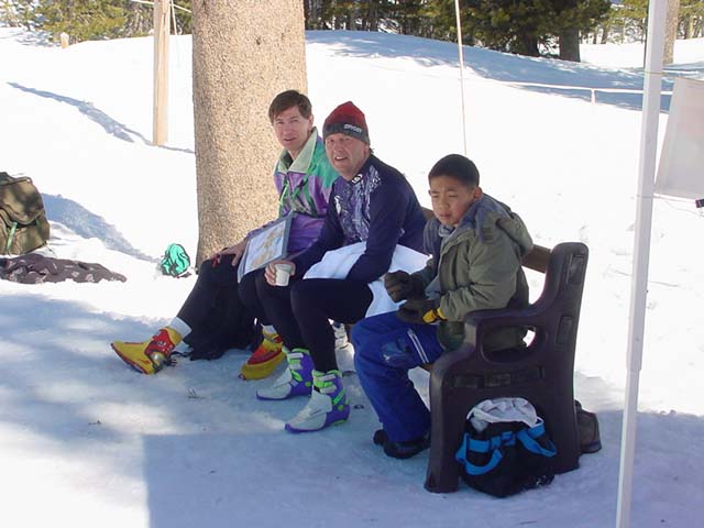 Kent Ohlund, recovering after doing the blue course, sits between Werner Haag and Jimmy Chung.